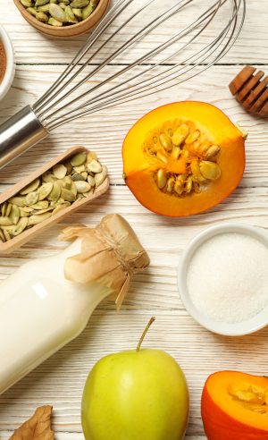 The ingredients are laid out on the table for preparing autumn pastries.